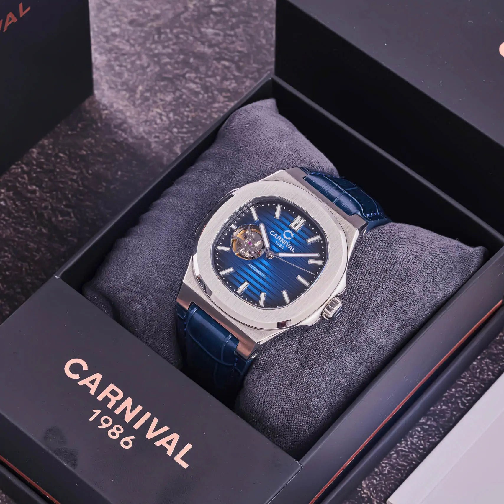 Carnival 8128G1 Bạc Xanh Dây Da ( 8128G1-VT-DD-X)